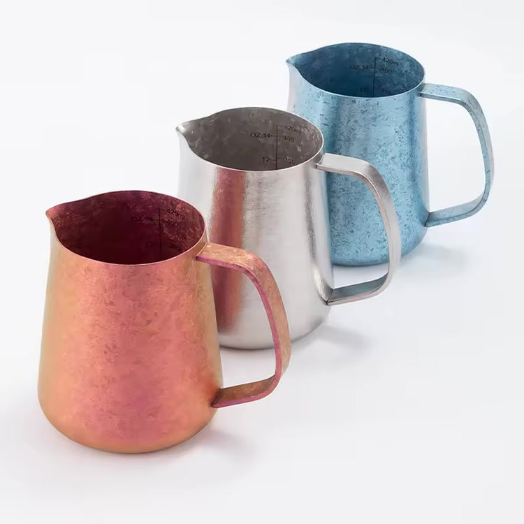 Purple, silver and sky-blue reference-finish titanium milk pitchers shown together.