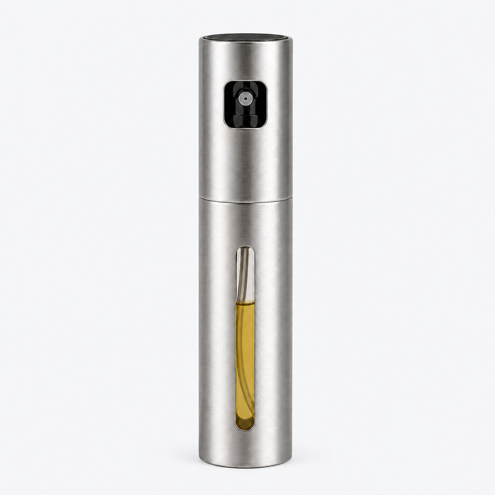 Custom stainless-steel and glass oil sprayer with visible golden oil on a clean cool-white background